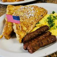 Two By Two · Two slices of our signature French toast or pancakes with two eggs any style, and your choic...
