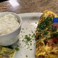 The Greek Omelette · Tomato, spinach and feta cheese.