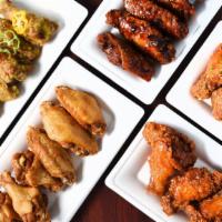 Wing Dinner · Wings served with rice and salad or cabbage.