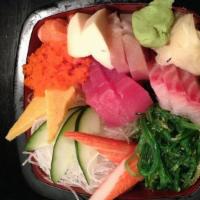 Chirashi Don · Assorted sashimi on seasoned rice. Includes miso soup and salad.