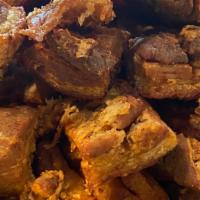 Chicharron Por Libra · Fried pork belly by the pound.