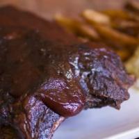 Baby Back Ribs · Rubbed and smoked. Served with fries and slaw.