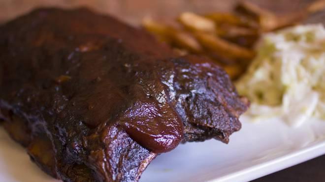 Baby Back Ribs · Rubbed and smoked. Served with fries and slaw.