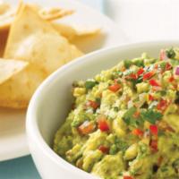 Fresh Guacamole  · Served with corn chips.