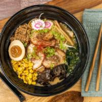Spicy Miso Ramen · Spicy pork broth with miso , topped with bean sprouts, corn, egg, ground pork, chashu pork, ...