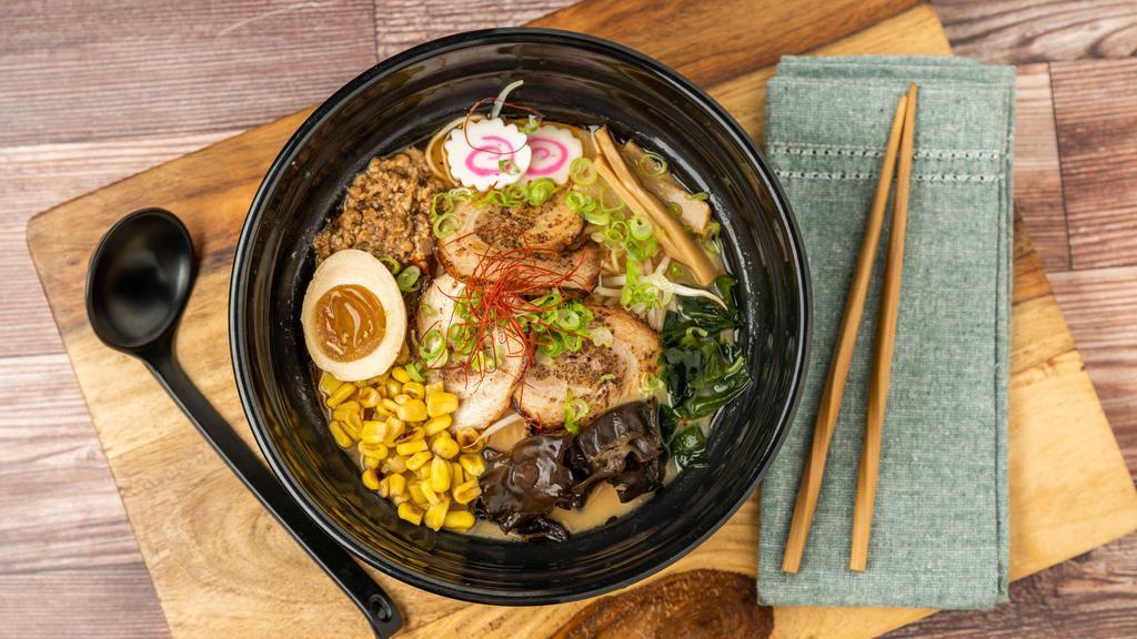 Spicy Miso Ramen · Spicy pork broth with miso , topped with bean sprouts, corn, egg, ground pork, chashu pork, bamboo shoots, seaweed, kikurage and scallion.