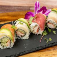 Rainbow Roll · California roll topped with tuna, salmon, white tuna & avocado.