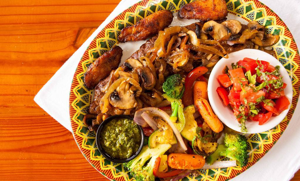 Palomilla Steak  · Our best seller! Marinated skirt steak grilled over an open fire and topped with onions and mushrooms. Served with chimichurri sauce and fried plantains. Your choice of two sides.