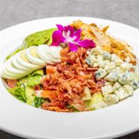 Cobb Salad · Romaine lettuce, tomatoes, onions, cucumber, bacon, egg, blue cheese, chicken breast, avocad...