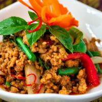 Basil  · Stir-fried minced chicken with green beans, onions, bell peppers and basil leaves in our spi...