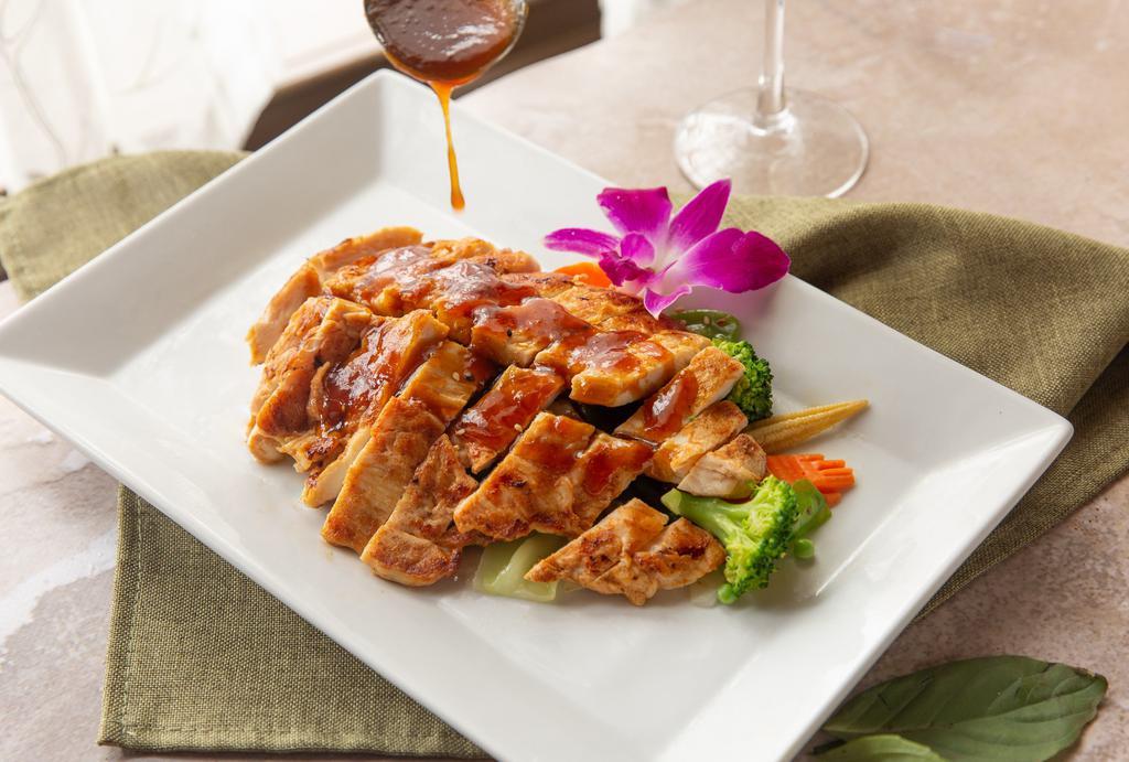 Teriyaki Chicken · Grilled and glazed in house teriyaki sauce. Served with assorted veggies.