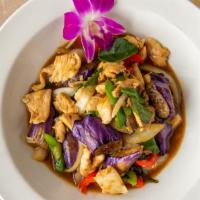 Eggplant · Stir-fried with eggplant, bell peppers, onions and basil leaves in a mild basil sauce.