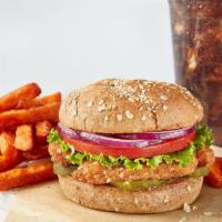 Vegan Chickenless Sandwich Lrg. Combo · Vegan. Crispy vegan chickenless patty, pickles, lettuce, tomato, red onion and whole wheat b...