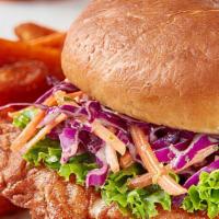 Wonderlust Sandwich Reg. Combo · Fried chicken, WonderSlaw, lettuce, pickled cucumbers and Wonder Sauce. Comes with fries and...