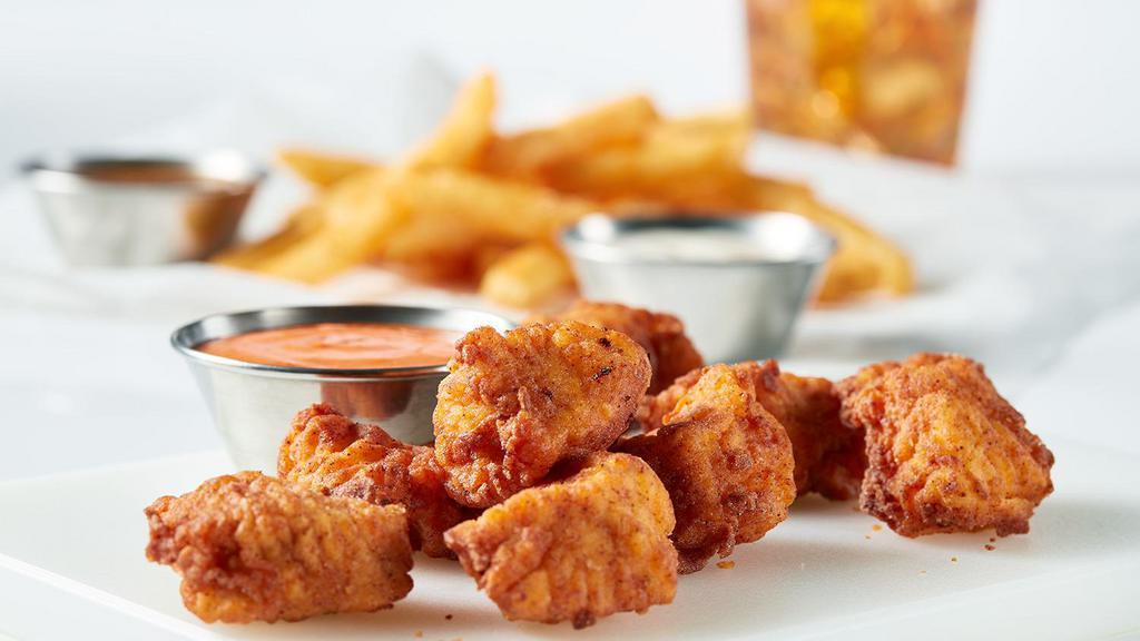 Spicy Nuggets Reg. Combo · Spicy. Comes with fries and a drink.