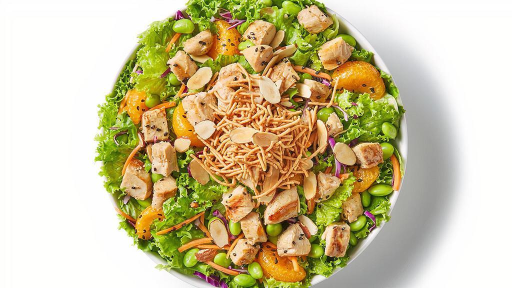 Chinese Chicken Salad · Soy-lime marinated grilled chicken, leaf lettuce, red cabbage, edamame, mandarin oranges, carrots, sesame seeds, toasted almonds and crispy rice noodles. Recommended with soy-lime vinaigrette.