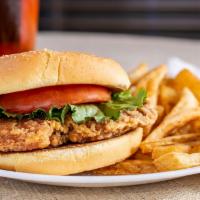 Southern Filet Sandwich ( Combo · A uniquely seasoned chicken breast filet, lettuce, tomato and mayo on a lightly toasted bun,...