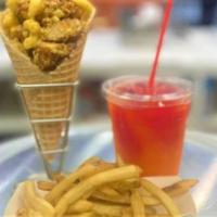 Chick'N Cone Meal · Crispy fried chicken, tossed in a signature sauce, served in a hand rolled waffle cone! Come...