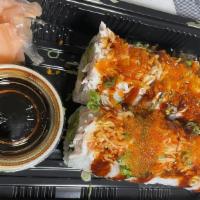Makimono · Shrimp tempura, avocado, cucumber, cream cheese topped with spicy eel sauce, green onion, ma...
