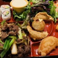 Beef Bulgogi Bento Box Dinner · Served with Salad, California Roll, Fried Gyoza, Vegetable Tempura, Takoyaki, Steamed Rice o...