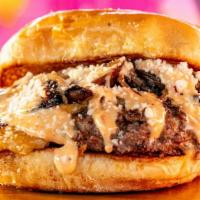 Dirty South Burger · All beef smash burger, cheddar cheese onions, vinegar poached mushrooms, la jama sauce.