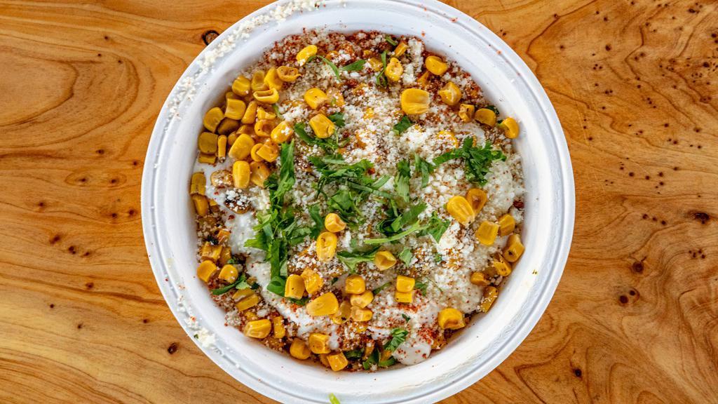 Elote Bowl · Charred corn, lime, cilantro, crema, cotija, tajin. Add protein for an additional charge.