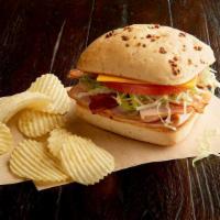 Build Your Own Sandwich · Build it! Choose meat, toppings, and bread.
Served with chips or baked chips.