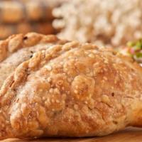 Supreme Vegan Empanada · Tasty empanada of kale and spinach, quinoa, mushrooms
and a touch of onion and green and red...