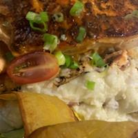 Salmon · Jerk or Cajun. With market vegetables red bliss garlic mashed potato