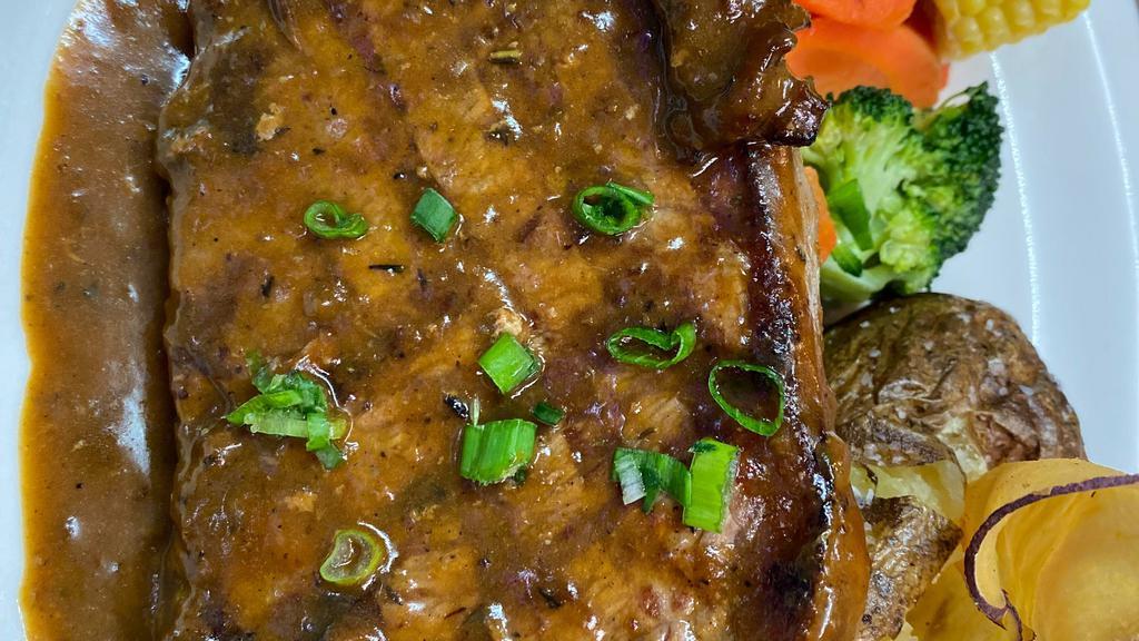 Sirloin  Steak · Served with Baked Parmesan Potato, Market Vegetables  and a Demi Glaze