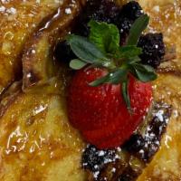 Caramelized Banana French Toast · Drizzled caramel and fruits compote