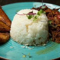 Ropa Vieja · Shredded and braised beef cooked in a creole sauce
