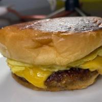 Nyc Bacon Egg Cheese · Your choice of Bacon or Sausage in between a garlic buttered bun with cheese and egg
Our tak...