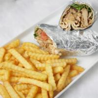 Chicken Shawarma · Thin Slice Of Marinated Chicken Cooked On A Slow Revolving Rotisserie.