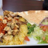 Chicken Shawarma · Thin Slice Of Marinated Chicken Cooked On A Slow revolving Rotisserie Served With Pita Bread