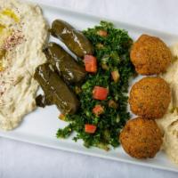 Vegetarian Delight · Vegan. Hummus, Baba Ghanouj, Three Grape Leaves, Three Falafels & Tabbouleh