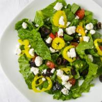 Greek Salad · A Mixture Of Fresh Lettuce, Tomatoes, Banana Peppers, Pickles, And Onions, Topped With Chunk...
