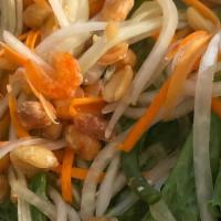 Papaya Salad · Shredded green papaya cooked with lime juice, tomato, dried shrimp and peanut.