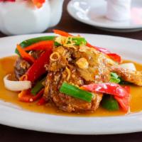 Diamond Duck · Crispy duck topped with tamarind sauce and decorated with scallions, red bell peppers, fried...