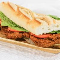 Beef Milanesa · Breaded thin steak with tomato, lettuce and mayonnaise.