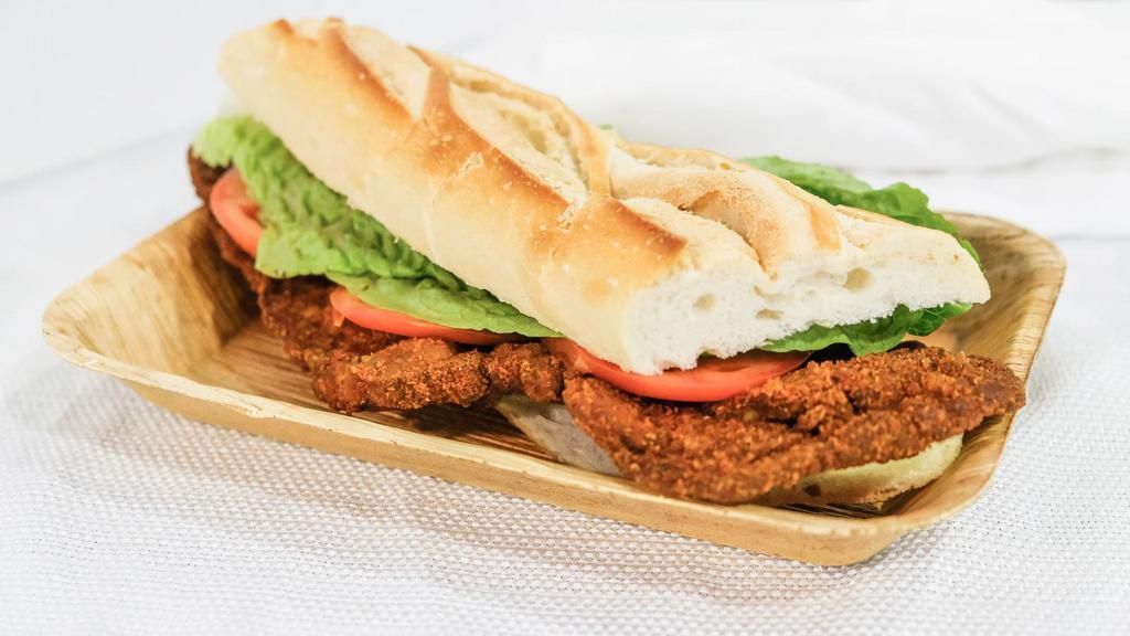 Beef Milanesa · Breaded thin steak with tomato, lettuce and mayonnaise.