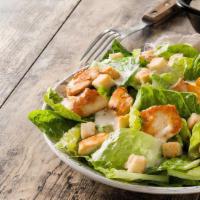 Caesar Salad · Classic caesar salad with croutons, romaine lettuce, chicken, and cheese