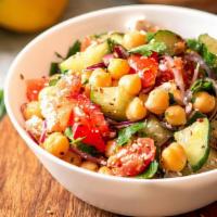 Mediterranean Chickpea Salad · Vegetarian. Seasoned chickpeas, tomato, bell peppers, green onions, kalamata olives, crumble...