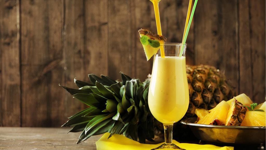 Pineapple Mixer · Pineapple, yogurt, banana chucks, and pineapple juice
