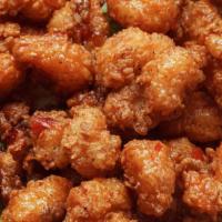 Pow Pow Shrimp · A generous portion of shrimp, lightly battered and fried, tossed in our sweet n' spicy sauce.