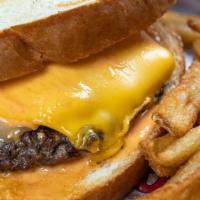 Patty Melt Burger · Melted American & pepper jack cheeses, sauteed onions, Comeback sauce on sourdough toast.