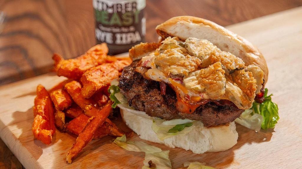 Southern Burger · House made pimento cheese, hickory smoked bacon, fried pickles, lettuce and tomato.