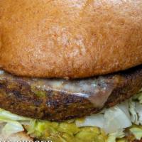Veggie Burger · Dr. Praeger's vegan burger grilled and topped with melted swiss, dressed with house made gua...