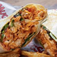 Inferno Wrap · Fried chicken tenders tossed in Buffalo Wang sauce, chopped and wrapped in a tortila with sh...