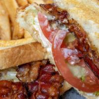 L.T.C. Sandwich · Hickory smoked bacon, lettuce, tomatoes, cheddar cheese, and mayo served on sliced sourdough...